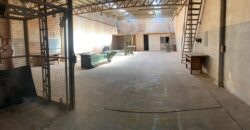 Galpón industrial ubicado a metros del foco comercial de Pablo Podestá, con buenos accesos y optimo estado.